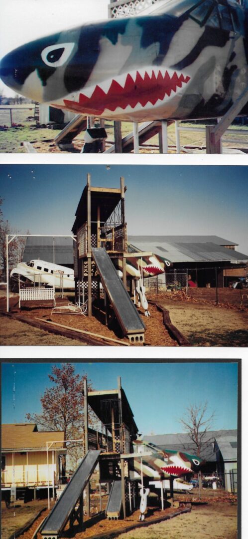 A playground slide with a climbing structure in a park.