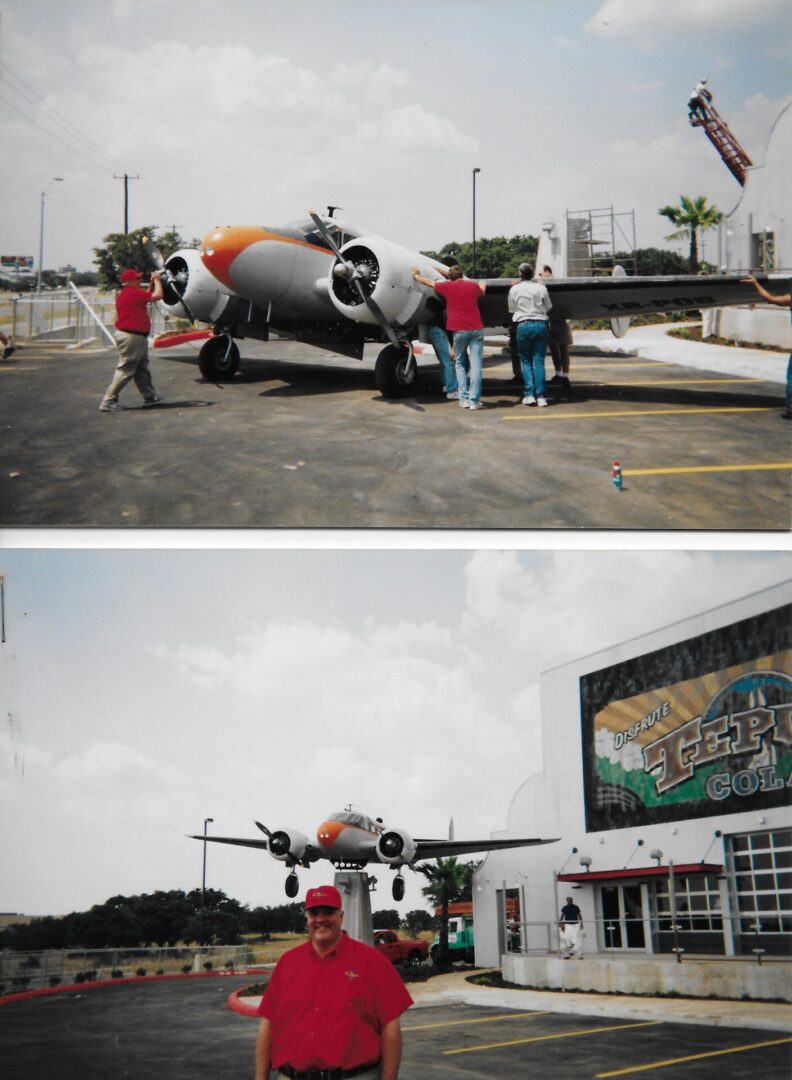 People interacting with a small airplane on a runway and near a building.